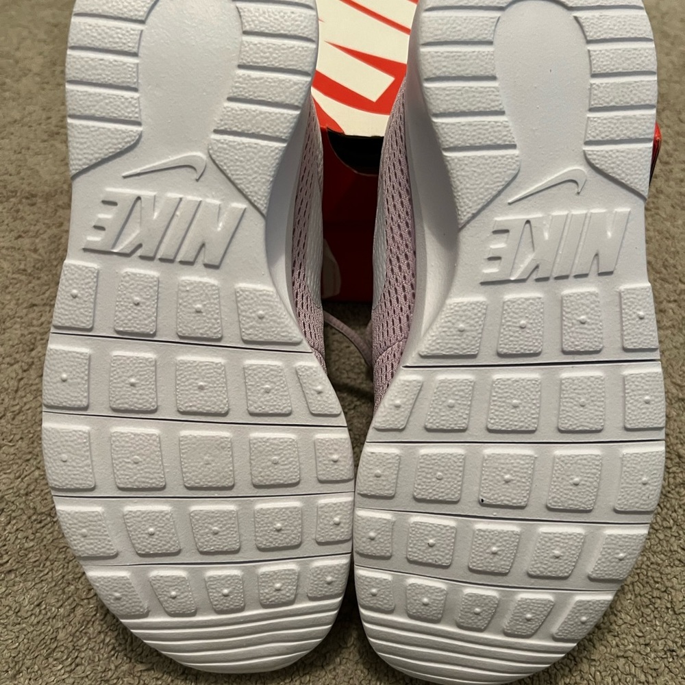Nike Tanjun kids running shoe.  Never worn.